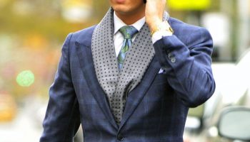 A very dapper Scott Disick chats on his cellphone and hails a cab in New York City.